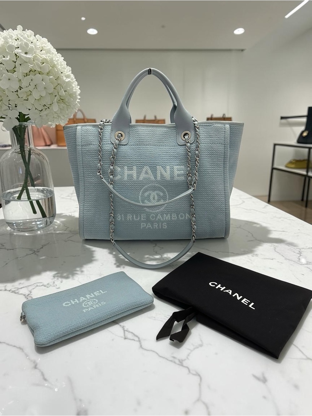 CHANEL Light Blue Canvas Tote with Chain-Strap Details